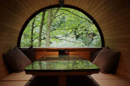 Outdoor dining. Sleep in the Trees - Hot Tub, Sauna and Slide