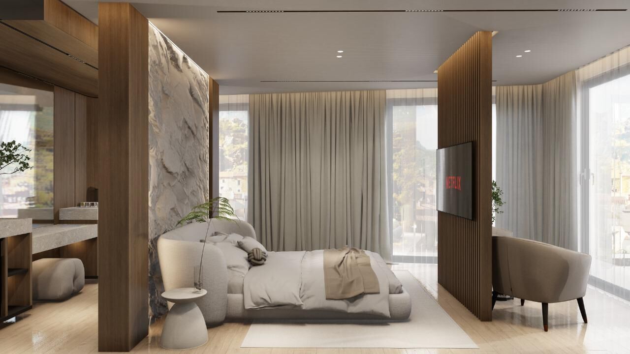 Un dormitorio moderno con una cama grande, televisión y vistas de la ciudad.