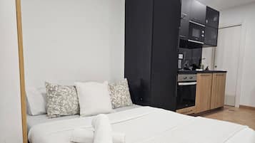 1 dormitorio, tabla de planchar con plancha, cuna de viaje y wifi