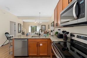 Fridge, microwave, oven, stovetop - Bella Vida Cozy 3BD/3BA *King Bed *Private Pool (Kissimmee)