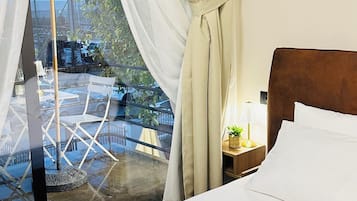 Deluxe driepersoonskamer, balkon | Gratis wifi