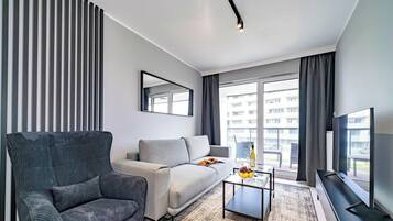 Classic Apartment (Kasprowicza 124) | Living area | Flat-screen TV