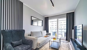 Classic Apartment (Kasprowicza 124) | Living area | Flat-screen TV - BalticON Apartments Kasprowicza (Kołobrzeg)