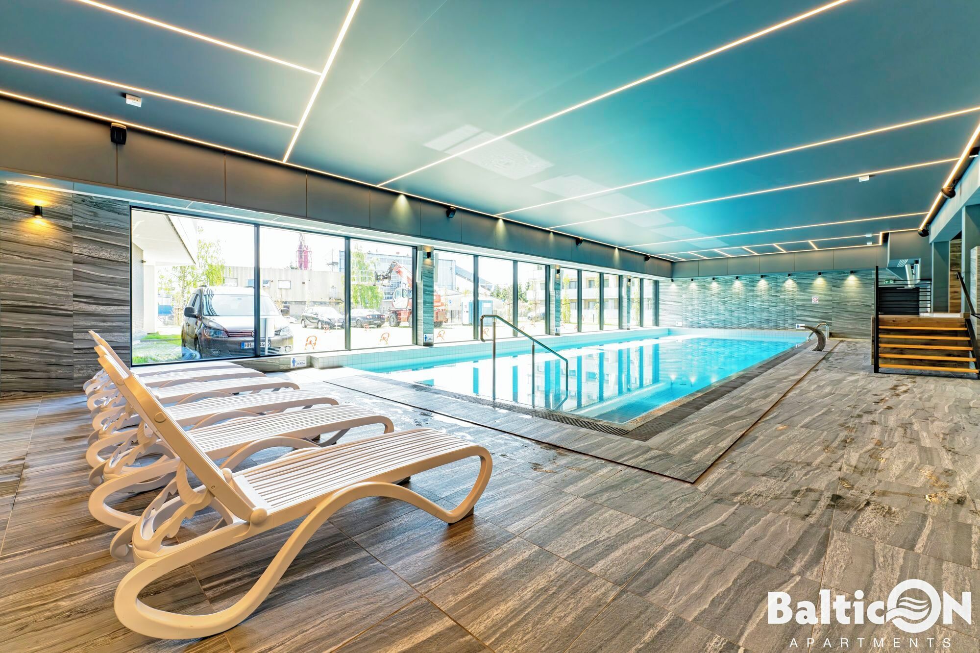 Indoor pool, open 9:00 AM to 9:00 PM, pool loungers, lifeguards on site