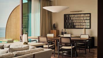 Grand Suite, 1 King Bed, Sea View | Living area | 65-inch Smart TV with cable channels, Netflix, table tennis