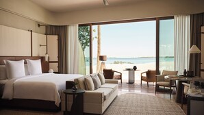 Chambre, 1 très grand lit, en front de plage