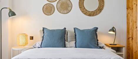 Iron/ironing board, travel crib, free WiFi, bed sheets