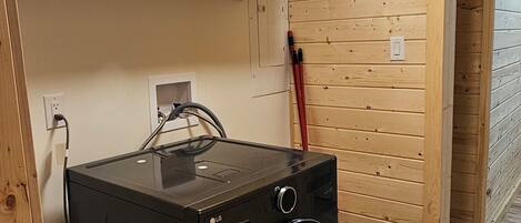 Cabaña de lujo, vista al resort | Área de sala de estar