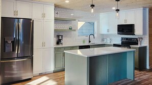Luxury Cabin, Resort View | Private kitchen | Highchair - Faloma Lakeside Cabins (Faloma)