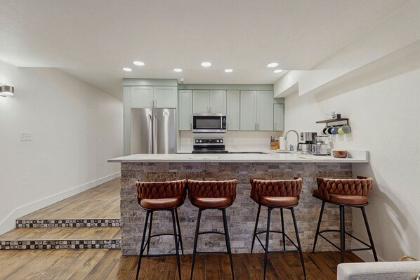 Fridge, microwave, oven, stovetop - Updated Ski In/Out Family Friendly Condo Near Shops, Restaurants (Girdwood)