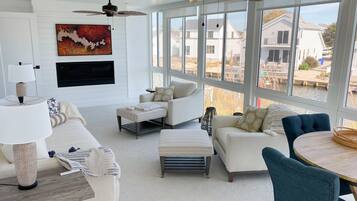 TV, fireplace, books