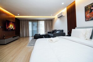 Habitación individual Deluxe | Área de sala de estar