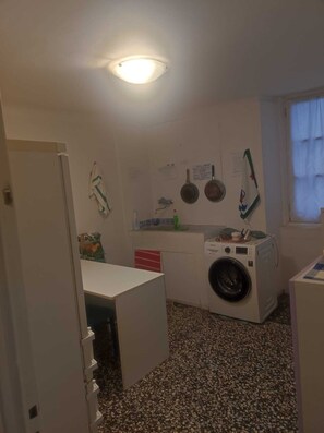 Fridge, stovetop, cookware/dishes/utensils