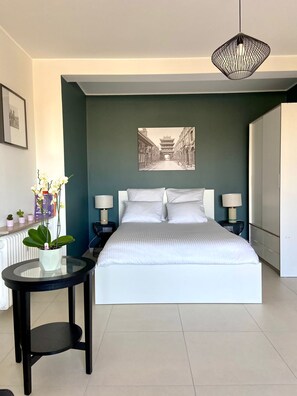 1 غرفة نوم ومكواة/لوح كي وخدمة الإنترنت وملاءات أسرّة