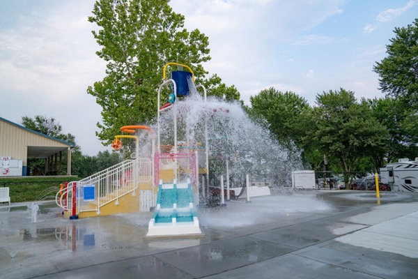 Watch little ones giggle under fountains and spray jets.