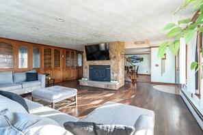 TV, fireplace - 8BR Family Oasis w/ Pool, Hot Tub, Firepit, and Playground! (Cayuga)