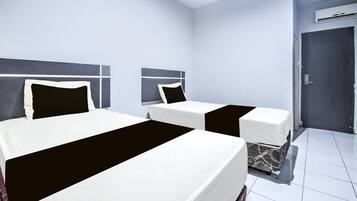 Kamar Twin Standar | Seprai premium, meja kerja, Wi-Fi gratis, dan seprai linen