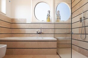 Double Room | Bathroom | Hair dryer, towels, soap, toilet paper