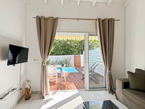 Living area - Mango Orange duplex with pool in Orient Bay! (Orient bay)