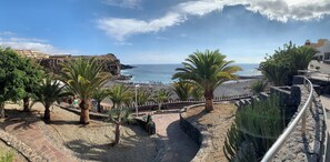 On the beach, beach towels - Spacious seafront apartment with terrace & pool, 20 m from the sea (Callao Salvaje)