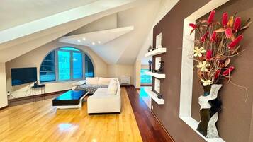 Luxury Apartment, City View | Living area