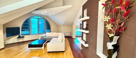 Lyxlägenhet - utsikt mot staden | Vardagsrum