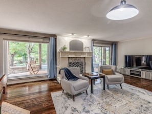 TV, fireplace - Ranchwood Manor Escape: Pool, Yard, Comfort in OKC (Oklahoma City)
