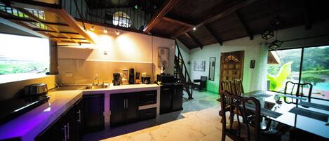 Fridge, microwave, stovetop, coffee/tea maker