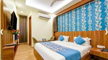 Premium bedding, desk, laptop workspace, free WiFi