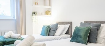 Modern 2BR Apartment with Water Views