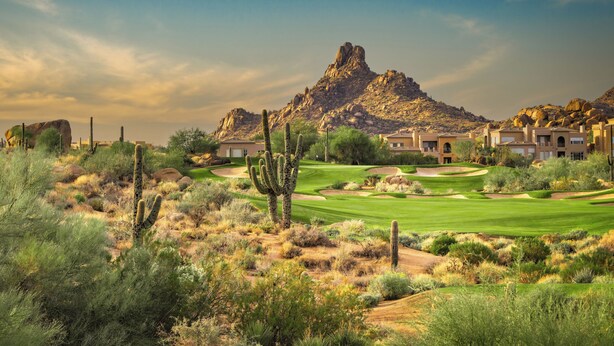 A desert landscape with a golf course, cacti, and a mountain in the background. - Scottsdale Golf Retreat at Troon North (Scottsdale)