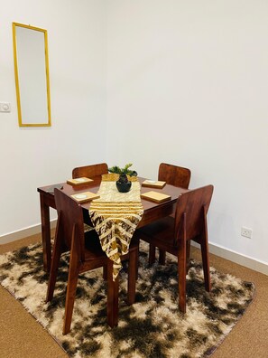 Apartment, Balcony, Pool View | In-room dining