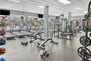 A gym with treadmills, weight machines, and free weights. - Marriott’s Grande Vista Orlando  One Bedroom Full Access Resort (Orlando)