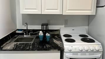 Signature Apartment | Private kitchen | Full-size fridge, microwave, oven, toaster