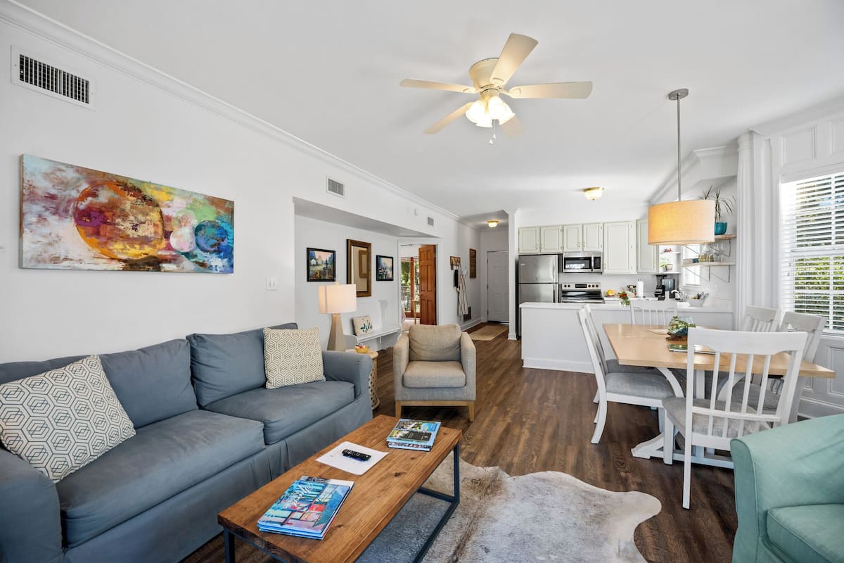 Camellia Luxury Suite, 2 Bedrooms, Non Smoking, Bay View | Living area | 43-inch Smart TV with digital channels, toys, books