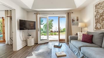 Dogwood Luxury Suite, 2 Bedrooms, Pets Allowed, Ground Floor | Living area | 43-inch Smart TV with digital channels, toys, books