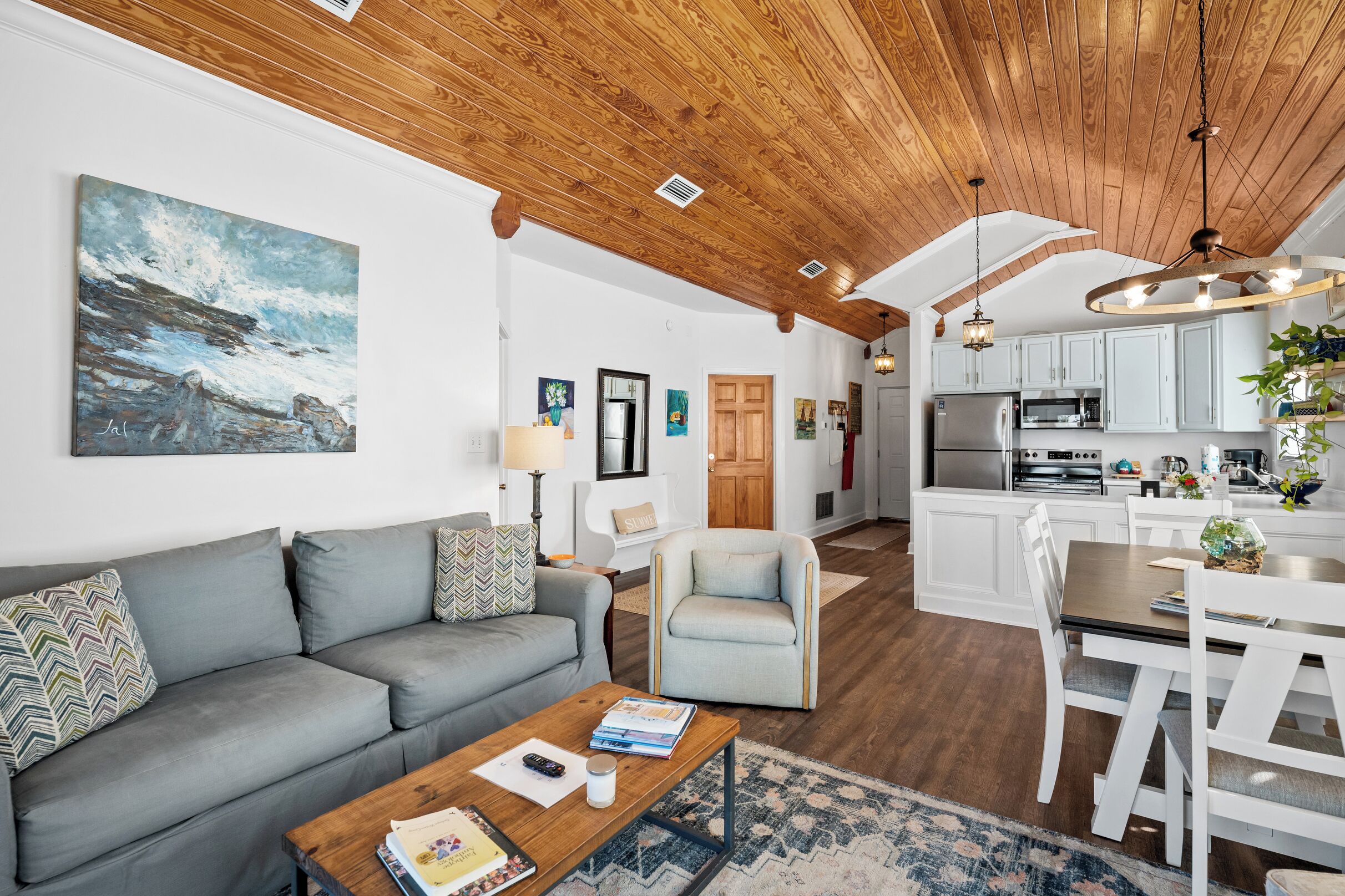 Azalea Luxury Suite, 2 Bedrooms, Bay View | Living area | 43-inch Smart TV with digital channels, toys, books