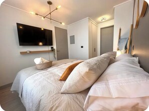 1 habitación, tabla de planchar con plancha, wifi y ropa de cama 