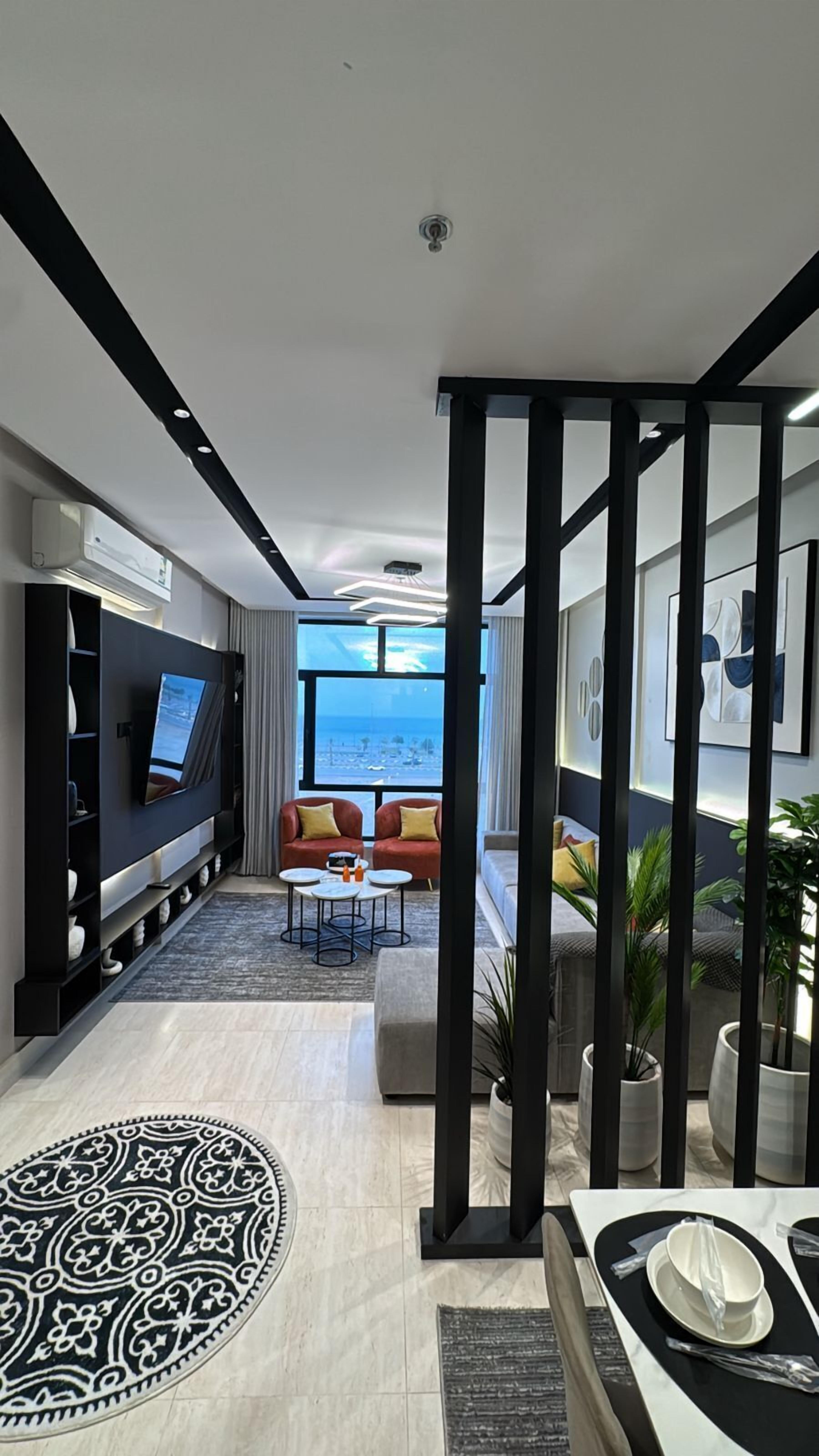 Suite estudio clásica, 1 cama Queen size | Área de sala de estar