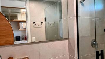 Premium Studio | Bathroom | Shower, towels, soap, toilet paper