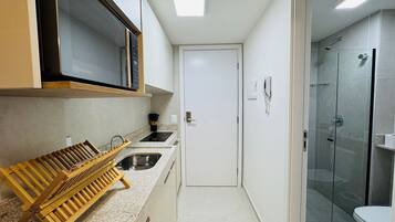 Comfort Studio | Bathroom | Shower, towels, soap, toilet paper