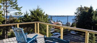 New! Peer over the Tree tops for a stunning view of the ocean!