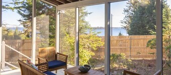 New! Peer over the Tree tops for a stunning view of the ocean!