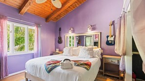 A bedroom with a bed, a guitar, a mirror, and a window with curtains. - Private Malibu Escape w/ Guest House, Fire Pits & Mountain Views The Malibu Retreat by Avantstay (Calabasas)