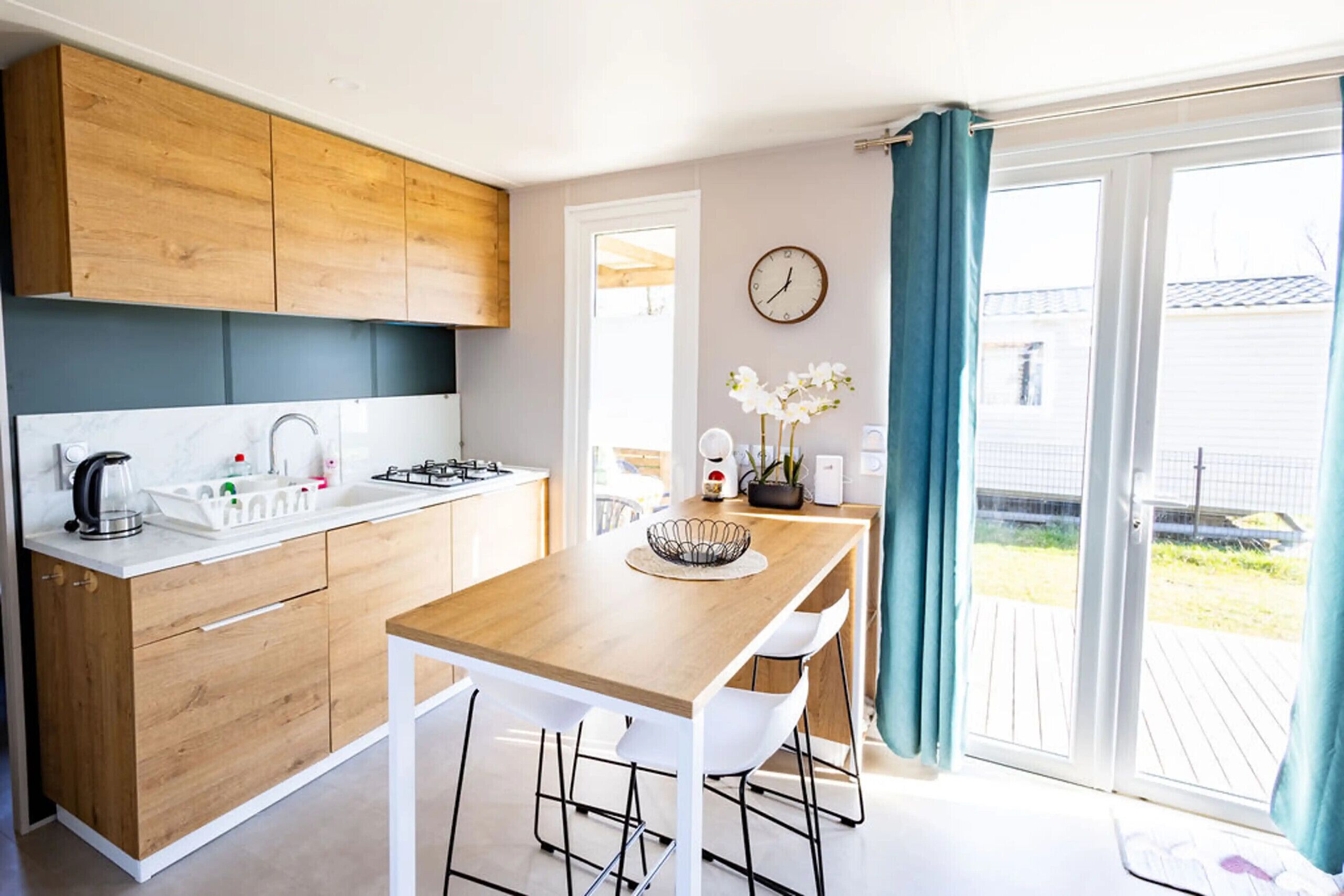 Fridge, microwave, coffee/tea maker, cookware/dishes/utensils