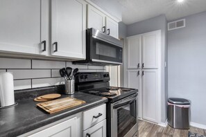 Fridge, microwave, oven, stovetop - Walk to AT&T Stadium - Modern 2BR Game Day Stay (Arlington)