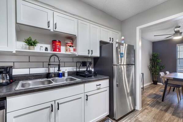 Fridge, microwave, oven, stovetop - Walk to AT&T Stadium - Modern 2BR Game Day Stay (Arlington)