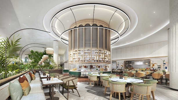 A modern restaurant with a central column, multiple seating areas, and a variety of table settings. - Crowne Plaza Dhaka Airport by IHG (Dhaka)