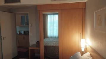 In-room safe, desk, laptop workspace, blackout curtains