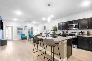 Fridge, microwave, oven, dishwasher - Modern 2BR – Epic Waters, AT&T, Gym & Shopping (Grand Prairie)